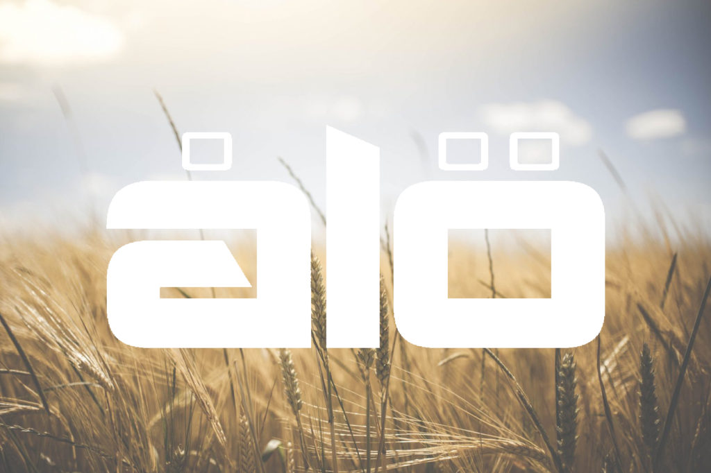 Image of Alo logo on top of an image of a field. Photo by glenn carstens peters